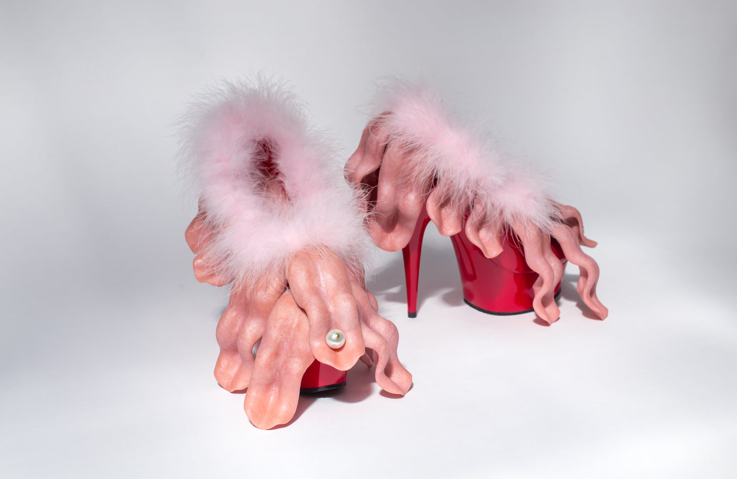 Total Touch Total Touch, unique work/wearable, 2017. Patent leather, pearl, marabou, mixed media. Size: h. 25 x d. 28 x w. 16 cm (each)