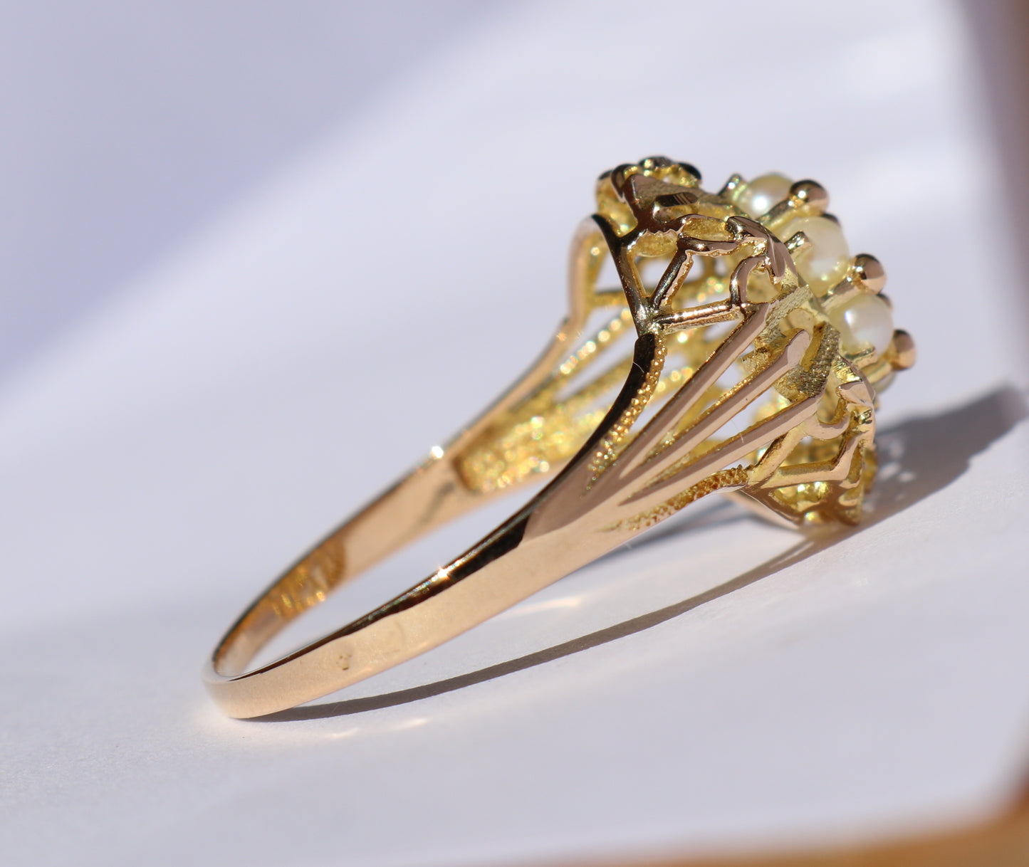14 kt gold ring with seed pearls