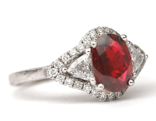 VERKOCHT 14 kt gouden ring 0.70 ct robijn en 0.60 ct diamanten