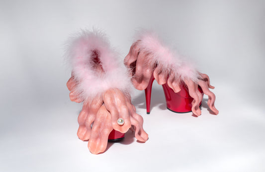 Total Touch Total Touch, unique work/wearable, 2017. Patent leather, pearl, marabou, mixed media. Size: h. 25 x d. 28 x w. 16 cm (each)