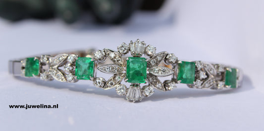 Verkocht 18 kt gouden armband met diamanten en smaragden