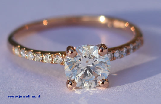 14 kt gouden ring gezet met 1.17 ct diamanten, centrale 0.91 ct. SI1 -F top wit