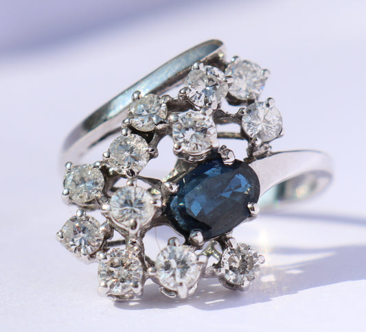14 kt gouden ring met saffier en 1.20 ct diamanten