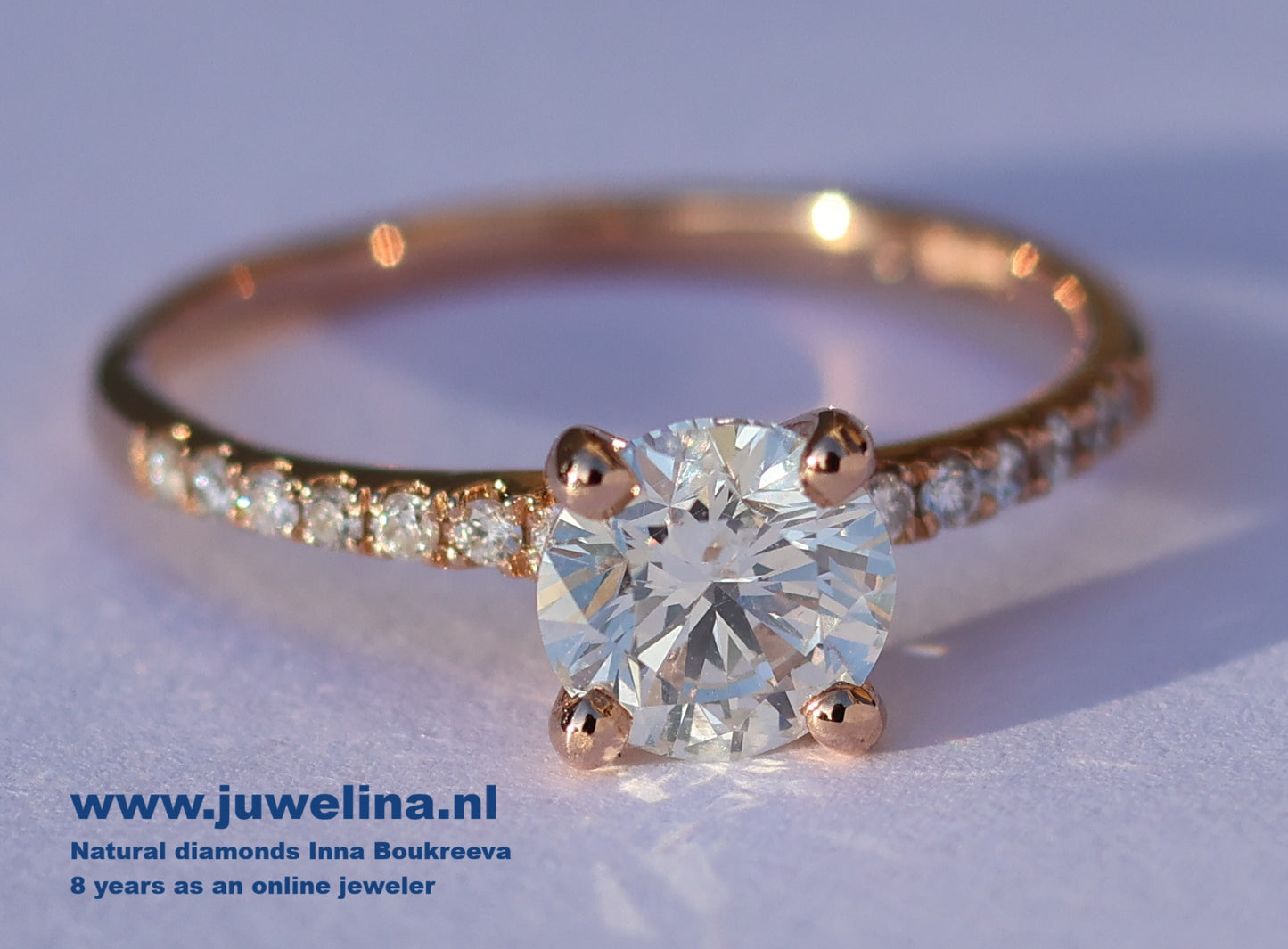 14 kt gouden ring gezet met 1.17 ct diamanten, centrale 0.91 ct. SI1 -F top wit