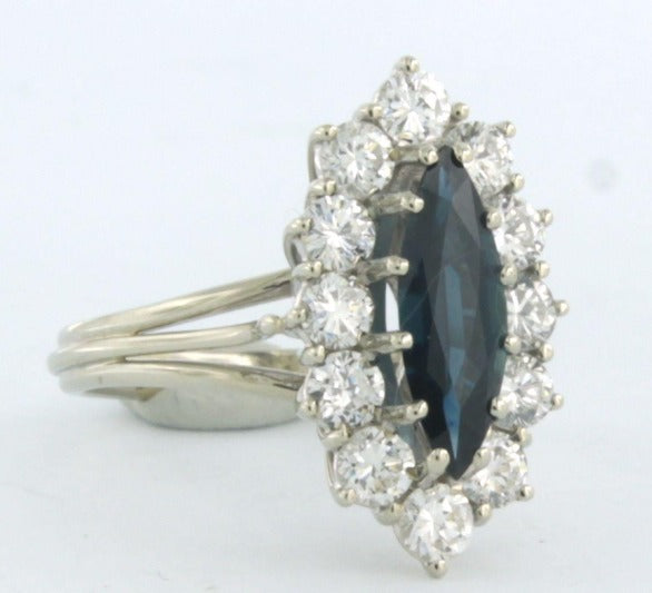 14 kt gouden ring met 1.20 ct diamanten en saffier